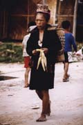 Žena z horského kmene Akha na tržišti v Muang Sing. Laos.
